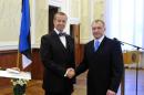 File-In this Feb. 23, 2010, file photo provided by the Office of the Estonian President, Estonian security service officer Eston Kohver, right, receives decoration from the Estonian President Toomas Hendrik Ilves, left. On Sept. 5, 2014 Estonia said Kohver was abducted by unknown gunmen on its territory and taken across the border to Russia. Russian Federal Security Service said the man was detained on its territory and suspected of being a spy. (AP Photo/Office of the Estonian President, File)