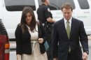 John Edwards, right, and his daughter Cate Edwards enter the federal courthouse for John Edwards' trial on charges of campaign corruption in Greensboro, N.C. on Tuesday, May 15, 2012. Edwards has pleaded not guilty to six counts related to campaign finance violations over nearly $1 million from two wealthy donors used to help hide the Democrat's pregnant mistress as he sought the White House in 2008. (AP Photo/The News and Observer, Shawn Rocco)