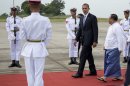 U.S. President Barack Obama walks on a red carpet as he arrives at Yangon International Airport in Yangon, Myanmar, on Air Force One, Monday, Nov. 19, 2012. This is the first visit to Myanmar by a sitting U.S. president. (AP Photo/Carolyn Kaster)