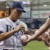 Tampa Bay Rays' Matsui signs autographs before a MLB American League baseball game against the New York Mets in St. Petersburg, Florida