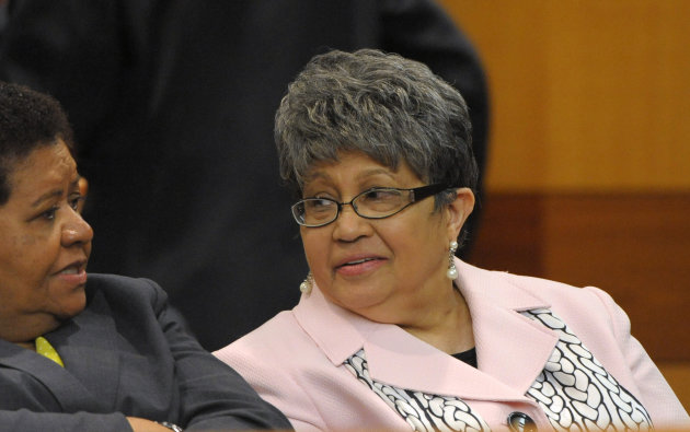 Former Atlanta Public Schools Superintendent Beverly Hall, right, waits for motions at a Fulton County Superior Court hearing for several dozen Atlanta Public Schools educators facing charges alleging a conspiracy of cheating on the CRCT standardized tests in Atlanta, Friday, May 3, 2013. (AP Photo/David Tulis)