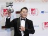 South Korean singer PSY poses with his Best Video award backstage during the MTV European Music Awards 2012 show at the Festhalle in Frankfurt