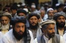 Afghan men attend a gathering launched by a political party ahead of an election campaign in Kabul