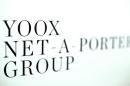 Yoox Net-A-Porter Group placard is seen in Bologna