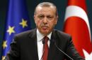 Turkey's President Tayyip Erdogan speaks during a news conference in Ankara