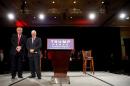 Republican presidential candidate Donald Trump and vice presidential candidate Mike Pence pray at a campaign event in Roanoke