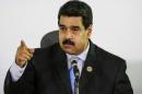 Venezuela's President Nicolas Maduro talks to the media during a news conference after the 17th Non-Aligned Summit in Porlamar