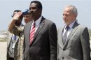 The new United Nations envoy for Somalia Kay is welcomed by Somalia's Information Minister Ilmoge at the airport in Somalia's capital Mogadishu