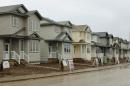 Houses for sale at a property development are seen in Fort McMurray, Canada, on October 24, 2009