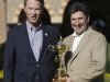 USA captain Davis Love III, left, and European captain Jose Maria Olazabal pose with the trophy at the Ryder Cup PGA golf tournament Monday, Sept. 24, 2012, at the Medinah Country Club in Medinah, Ill. (AP Photo/David J. Phillip)