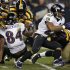 Baltimore Ravens' Ray Rice runs the ball against the Pittsburgh Steelers in the third quarter of their NFL football game in Pittsburgh