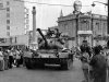 FILE- A Turkish army tank passes the Saray Hotel in the Turkish section of Nicosia, Cyprus, in this file photo dated July 24, 1974, as an image of Kemal Ataturk, founder of the modern Turkish republic looks down from a rooftop behind, as Turkey seized nearly 40 percent of the island and even more of its economic potential. After the 1974 invasion the people of Cyprus were forced to rebuild their lives and their economy from scratch, not something they Cypriot people ever wanted to to again, but following the 2013 collapse of the financial industry and the international financial bailout, even the most sanguine forecaster predicts many years of recession and sky-high unemployment. (AP Photo, File)