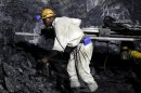 A mine worker is seen underground in South Deep mine outside Johannesburg