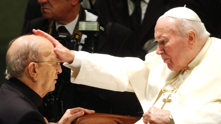 FILE - In this Nov. 30, 2004 file photo, Pope John Paul II gives his blessing to father Marcial Maciel, founder of Christ&#39;s Legionaries, during a special audience the pontiff granted to about four thousand participants of the Regnum Christi movement, at the Vatican. First, one of the Legion of Christ’s top officials abruptly quit the troubled religious order in frustration over the slow pace of change. Then priests in the cult-like movement empowered protégés of or associates of the order’s disgraced founder, the Rev. Marcial Maciel, to vote for their next leader. The past month has seen several problematic developments in the Legion’s efforts to rehabilitate itself as it moves toward electing a new leadership next month in what it hopes will be the culmination of a three-year Vatican experiment to overhaul a damaged order. Yet behind the scenes, high-ranking members continue to speak nostalgically and even reverently of Maciel _ a sexual predator who fathered three children and was, in the words of Vatican-appointed investigators, &quot;devoid of scruples and authentic religious meaning.&quot; (AP Photo/Plinio Lepri, File)