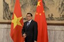 Chinese Premier Li prepares to meet the Vietnamese President Tan Sang at Diaoyutai State Guest House in Beijing