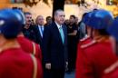 Turkish President Tayyip Erdogan reviews a guard of honour as he arrives to the Turkish Parliament in Ankara