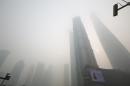 Photographs: Shanghai pollution stops flights, forces health warning