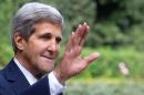 US Secretary of State John Kerry waves as he arrives for a meeting with Israeli Prime Minister Benjamin Netanyahu at Villa Taverna, the US Ambassador's residency in Rome, on October 23, 2013