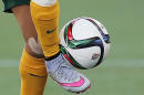 FILE - In this June 12, 2015, file photo, Australia's Samantha Kerr controls the ball during the second half of a FIFA Women's World Cup soccer game against Nigeria in Winnipeg, Manitoba, Canada. The fields are heating up, there are little black rubber pellets everywhere, and feet are covered with blisters. The use of artificial turf at this year's tournament in Canada has been a contentious issue with the players since it was included in the nation's bid in 2011. (John Woods/The Canadian Press via AP, File)