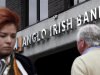 File photograph shows pedestrians walking past a branch of the Anglo Irish Bank in Dublin