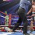Juan Manuel Marquez of Mexico is directed to a neutral corner after knocking out Manny Pacquiao of the Philippines, during the sixth round of their welterweight fight at the MGM Grand Garden Arena in Las Vegas