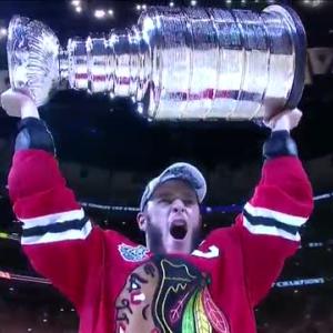 Bettman hands the Stanley Cup to Toews