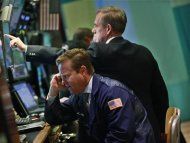 Traders work on the floor of the New York Stock Exchange, July 26, 2012. REUTERS/Brendan McDermid