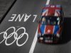 A taxi passes alongside one of the official Olympic Lanes on a street in central London Monday, July 23, 2012, ahead of the 2012 Summer Olympics. (AP Photo/Ben Curtis)