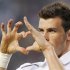 Tottenham Hotspur's Gareth Bale gestures a heart shape after scoring against the Los Angeles Galaxy during the first half of an international friendly soccer match in Carson, California