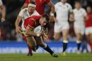 Wales' Gareth Davies scores a try during the Rugby World Cup Pool A match between England and Wales at Twickenham Stadium, London, Saturday, Sept. 26, 2015. (AP Photo/Frank Augstein)
