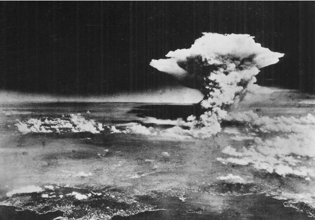 FILE - In this Aug. 6, 1945 file photo released by the U.S. Army, a mushroom cloud billows about one hour after an atomic bomb was detonated above Hiroshima, western Japan. Hiroshima will mark the 67t