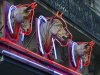 3 statues of horses' heads,  above a horsemeat butcher shop  in Paris, Friday Feb 15, 2013.  Tests have found horsemeat in school meals, hospital food and restaurant dishes in Britain, officials said Friday, as the scandal over adulterated meat spread beyond frozen supermarket products. French French Consumer Affairs Minister Benoit Hamon said Thursday that it appeared fraudulent meat sales over several months reached across 13 countries and 28 companies. He identified French meat wholesaler Spanghero as a major culprit. (AP Photo/Jacques Brinon)