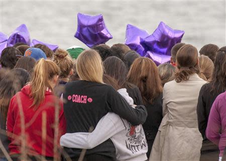 People gather at beach for vigil in honor of slain student Maren Sanchez in Milford