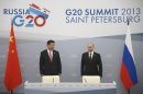 Russia's President Vladimir Putin meets with his Chinese counterpart Xi Jinping at the G20 Summit in Strelna near St. Petersburg