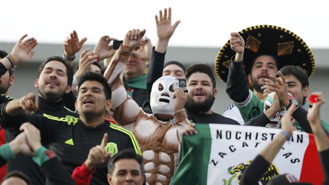 Mexico fans await the start of their team&#39;s first round Copa America 2015 soccer match against Ecuador at Estadio El Teniente in Rancagua