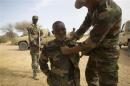 Nigerien soldiers practice apprehending a suspect during Flintlock 2014 in Diffa