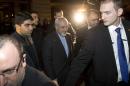 Iranian Foreign Minister Mohammad Javad Zarif, centre, arrives at his hotel in Geneva Switzerland, Friday evening Nov. 8, 2013, following his meeting with U.S. Secretary of State John Kerry and European Union foreign policy chief Catherine Ashton. (AP Photo/Jason Reed, Pool)