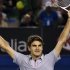 Roger Federer of Switzerland celebrates defeating Jo-Wilfried Tsonga of France in their men's singles quarter-final match at the Australian Open tennis tournament in Melbourne