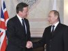 Russia's President Vladimir Putin shakes hands with Britain's Prime Minister David Cameron during their meeting before the G20 summit in Los Cabos