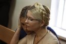 Ukrainian ex-prime minister Tymoshenko and her daughter Yevhenia attend a session at the Pecherskiy district court in Kiev