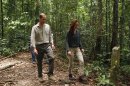 Prince William, left, and his wife Kate, the Duke and Duchess of Cambridge walk through the rainforest in Danum Valley Research Center in Danum Valley, Sabab, Malaysia, Saturday, Sept. 15, 2012. (AP Photo/ Vincent Thian, Pool)