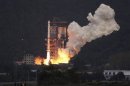 A Long March 3A rocket carrying the Chang'e One lunar orbiter blasts off from the Xichang Satellite Launch Centre