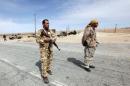 Libyan soldiers man a checkpoint in Wadi Bey, west of the Islamic State-held city of Sirte