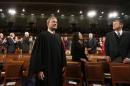 U.S. Supreme Court Chief Justice John Roberts arrives prior to President Barack Obama's State of the Union speech on Capitol Hill in Washington