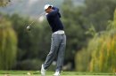 Tiger Woods tees off on the fifth hole during the first round of the World Challenge golf tournament in Thousand Oaks