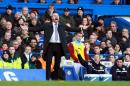 Burnley's English manager Sean Dyche gestures during the football match between Chelsea and Burnley at Stamford Bridge in London on February 21, 2015