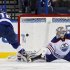 Tampa Bay Lightning's Purcell shoots past Edmonton Oilers goalie Khabibulin during the shootout in their NHL hockey game in Tampa