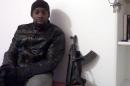 Screengrab taken on January 11, 2015 from a video released on Islamist social networks shows a man claiming to be Amedy Coulibaly, who killed four hostages after seizing a Kosher supermarket in Paris on January 9, 2015