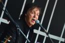 Sir Paul McCartney performs at Times Square on October 10, 2013 in New York City