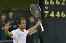 Lukas Rosol of the Czech Republic celebrates after defeating Rafael Nadal of Spain in their men's singles tennis match at the Wimbledon tennis championships in London